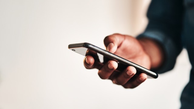 holding mobile phone